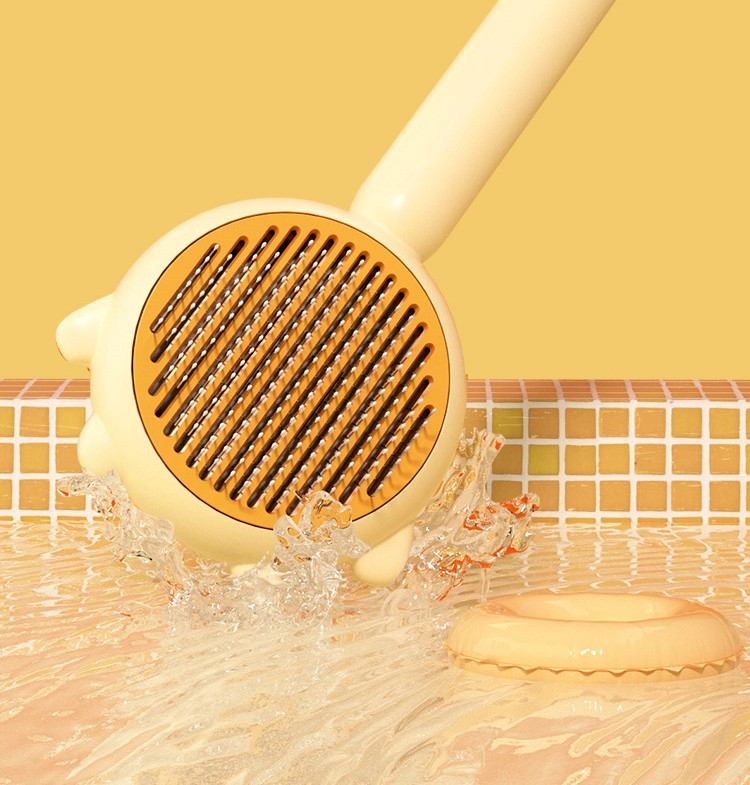 Feline grooming brush